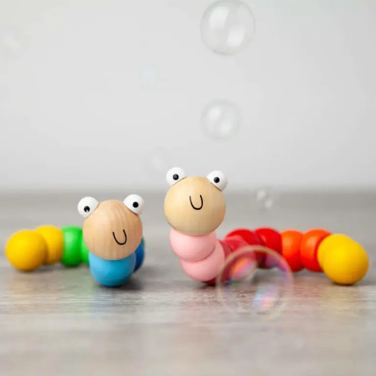 Leksak i Trä med Ställbara Leder